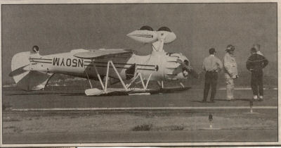 Waco biplane upside down on runway